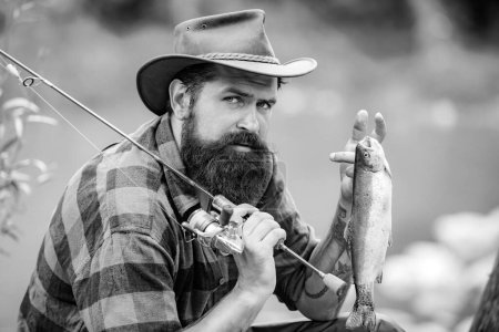 Photo for Bearded fisher. Male hobby. Successful fly fishing. Fisher masculine hobby. Home of hobbies. Life is always better when I am fishing. Fisherman with fishing rod. Giving your hobby - Royalty Free Image