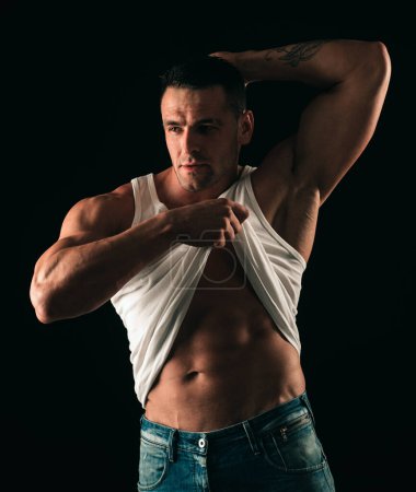 Photo for Muscular man showing abs. Six packs. Male striptease. Mans bare torso. Handsome guy posing. Sporty healthy strong muscle guy. Shirtless model - Royalty Free Image