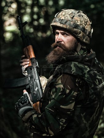 Photo for Ukraine war. Military conflict, geopolitical concept. Stop war and russian aggression in Ukraine. Ukraine on military uniform. Ukrainian soldier with assault rifle AK - Royalty Free Image