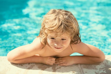 Photo for Child boy play in tropical resort. Children fun. Cute kid relaxing on swimming pool. Child having fun in summertime - Royalty Free Image