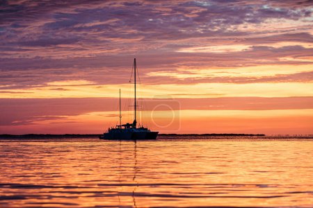 Photo for Summer cruise. Yacht boat on the sea. Sailboats at sunset. Ocean yacht sailing - Royalty Free Image