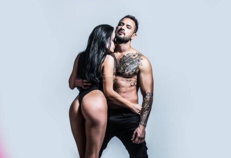 Latin lover. Romantic couple in love dating. Man embracing woman in the tender passion. Sexy couple in sensual love. Foreplay and love games of sexy couple. Sexy seduction. Erotic people concept