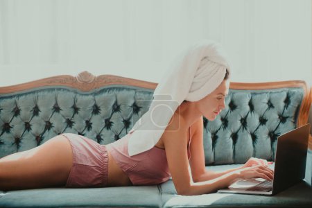 Photo for Sexy business woman freelancer working online marketing, e-commerce, telemarketing. Relaxed young sexy female models in bedroom. Attractive sexy girl chilling rest in room - Royalty Free Image