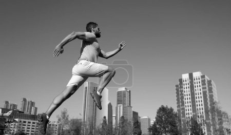 Photo for Athlete runner feet running in city park. Jogging concept at outdoors. Man running for exercise on City background - Royalty Free Image
