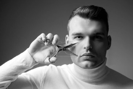Photo for Macho confident barber cut hair. Barbershop service concept. Professional barber equipment. Cut hair. Man strict face hold scissors. Barber glossy hairstyle hold steel scissors. Create your style. - Royalty Free Image
