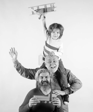 Photo for Family relationship between Grandfather Father and Grandson. Man in different ages. Generation of people and stages of growing up. Happy grandfather and grandson, isolated - Royalty Free Image