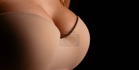 Photo for Lingerie model. Women breasts. Sexy breas, boobs in bra, sensual tits. Beauty slim female body. Closeup of sexy girl boob in black bra, copy space - Royalty Free Image