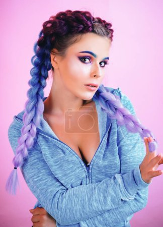 Photo for Funny girl with two braids. Girl with long braids. Fashion trend, Fashionable cutie. Hairdresser salon. Hairstyles style - Royalty Free Image