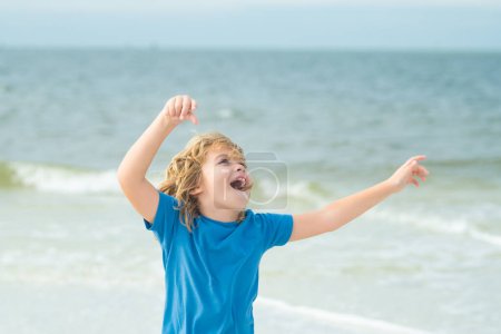 Photo for Cute child playing outdoor on summer beach. Little kid on summer vacations. Happy child rest on sea. Summer vacation concept. Kids summer travel and adventure. Happy childhood - Royalty Free Image