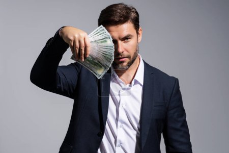 Photo for Man with dollars banknotes. Business man holding lots of 100 dollar bills. Easy money credit. Black cash. Payday and payment concept. Profit and richness. Earn money. Businessman successful deal - Royalty Free Image