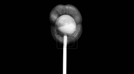 Photo for Blow job concept. Woman lips sucking lollypop. Woman holding lollipop in mouth, isolated on black. Red lip, sensual and sexy concept - Royalty Free Image
