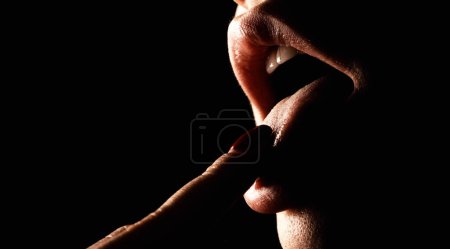 Photo for Lesbian kiss lips. Sexy lesbian lovers foreplay. Closeup of women mouths lick finger - Royalty Free Image