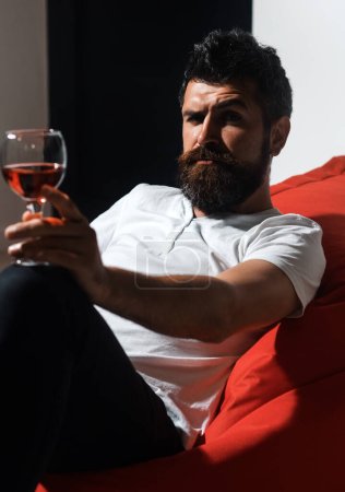Photo for Man in depression drinking wine. Alcohol addiction. Home alone drunk party. Bad habits. Alcohol dependence - Royalty Free Image