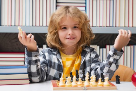 Photo for Chess school for kids. Kid thinking about chess. The concept of learning and growing children. Chess, success and winning. Board logic game, kids hobby and lifestyle - Royalty Free Image
