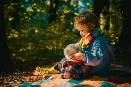 Photo for Inseparable with toy. Boy cute child play with teddy bear toy forest background. Child took favorite toy to nature. Picnic with teddy bear. Hiking with favorite toy. Better together. Happy childhood. - Royalty Free Image