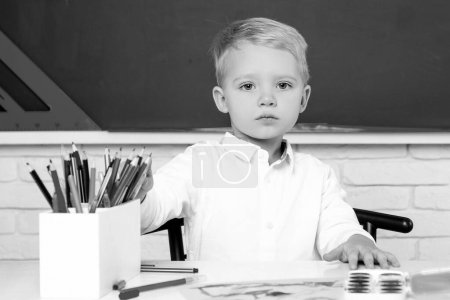 Photo for Elementary school. Child home studying and home education. Schoolkid or preschooler learn. Teachers day. Child tutoring - Royalty Free Image