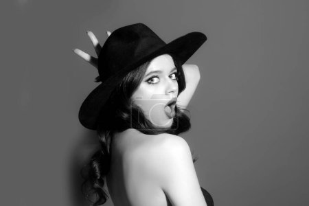Photo for High-fashion portrait. Sexy sensual elegant woman in black hat. Trendy Retro fashion. Isolated - Royalty Free Image