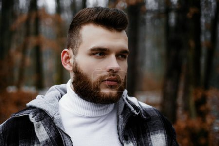Photo for Lumbersexual concept. Bearded lumberjack checkered clothes. Brutal man walk in forest. Hipster lifestyle. Masculinity and brutality. Lumberjack style. Stylish guy lumberjack. Well groomed hipster. - Royalty Free Image