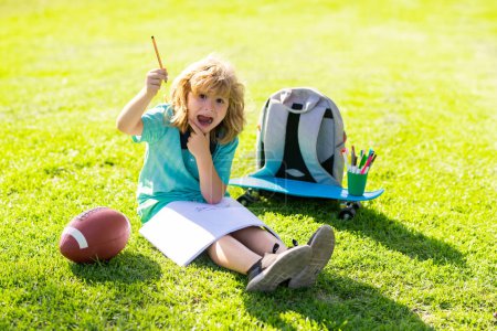 Photo for Child painter draw on playground. School kid drawing in summer park, painting art. Little painter draw pictures outdoor. Happy child playing outside. Drawing summer theme - Royalty Free Image