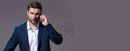 Photo for Banner of man in suit using mobile smart phone. Banner for header, copy space. Poster for web design - Royalty Free Image