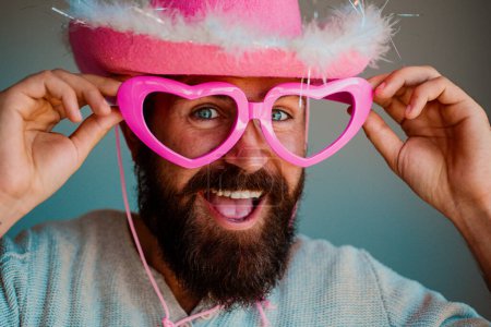 Photo for Fun cowboy. Happy man with funny pink glasses smile face closeup. Handsome smiling young guy. Positive human facial expressions and emotions - Royalty Free Image