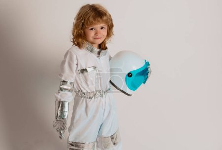 Foto de Little boy astronaut. Child boy playing astronaut with spaceman - Imagen libre de derechos