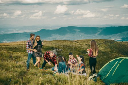 Photo for Adventure travel hike and tourism people concept. Countryside hiking. Students on summer vacation - Royalty Free Image