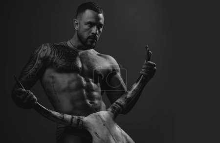 Photo for Sexy man with erotic masculine, body six pack hold bull horns. Sexy male torso, seductive stranger with muscular body. Guy hunk, brutal sex symbol - Royalty Free Image