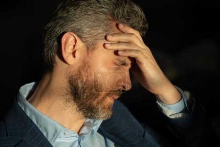 Photo for Tired man feel pain head. Close up portrait of stressed man suffer from headache at office. Stressed job. Painful man got migraine touches her head because of pain. Stressed, tired man from headache - Royalty Free Image