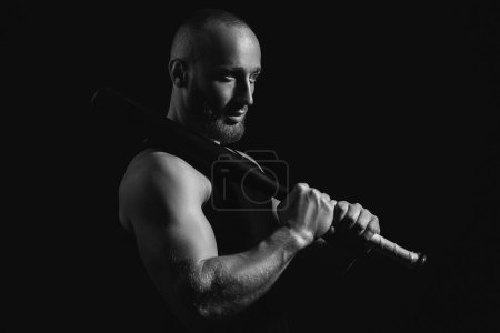 Photo for Brutal man, handsome serious male model. Strong muscular male body, muscles guy. Brutal man with baseball bat for fighting - Royalty Free Image