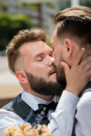 Photo for Gay kiss on wedding. Marriage gay couple tender kissing. Close up portrait of gay kissed. Gay with partner with care and love - Royalty Free Image