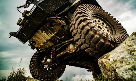 Photo for Off road car on mountain road. Car tire. Tire for offroad - Royalty Free Image