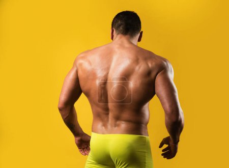 Photo for Male buttocks. Muscular back. Strong backside. Mens ass and powerful shoulders. Manliness booty buttocks. Sexy man with muscular body and bare torso - Royalty Free Image