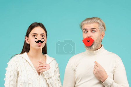 Photo for Concept of gender equality, equal rights for both sexes. Identity transgender, gender stereotypes. Funny couple of woman with moustache and man with red lips - Royalty Free Image