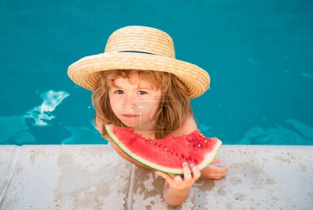 Photo for Child with watermelon in pool outdoor. Kid having fun in swimming pool. Kids summer vacation and healthy eating concept - Royalty Free Image