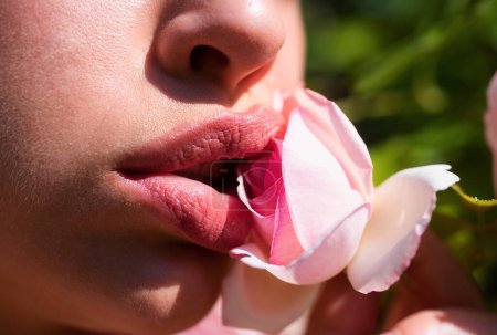 Photo for Lips with lipstick closeup. Beautiful woman lips with rose. Oral sex - Royalty Free Image