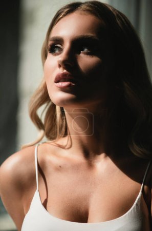 Photo for Portrait of beautiful young woman. Sensual beauty female model face close up. Natural beauty woman. Sexy female posing in studio - Royalty Free Image