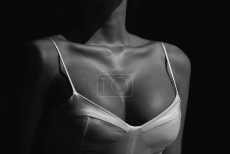 Photo for Closeup sexy woman boobs and slim body, female sexy breast. Isolated on black, close up - Royalty Free Image