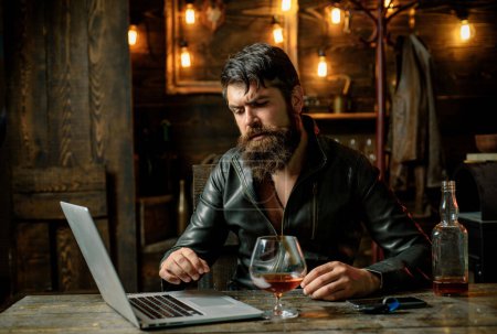 Photo for Bearded business man with glass of whiskey. Stressed from hard work - Royalty Free Image