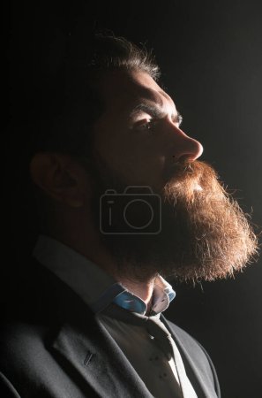 Photo for Bearded man with beard, bearded gay. Barbershop concept. Shadow male bearded profile - Royalty Free Image