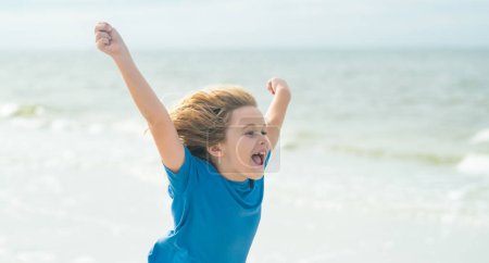 Photo for Excited child running in the summer sea. Cute kid run on summer sea. Funny expressive emotional boy running on summer beach. Boy enjoys run on summer beach. Amazed child. Expressive emotional face - Royalty Free Image