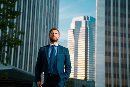 Photo for Businessman stand up and night city background - Royalty Free Image