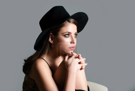 Photo for Sensual fashion woman face close up. Beauty portrait of young sexy woman in black hat. Vogue Style Portrait - Royalty Free Image