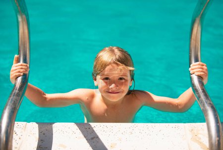 Photo for Cute child boy swim in swimming pool, summer water background with copy space. Funny kids face. Summer activities for happy child on the pool - Royalty Free Image