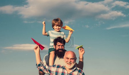 Photo for Men generation. Father and son with grandfather - happy loving family. Enjoy family together. Grandfather with son and grandson having fun in park - Royalty Free Image