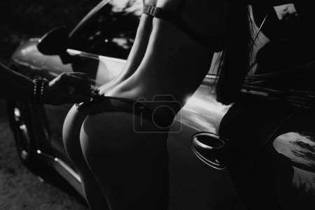 Foto de Gorgeous buttocks. Sensual woman. Erotic game. Big sexy butt of beautiful girl - Imagen libre de derechos