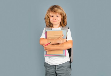 Photo for School teenager child with book and copybook. Teenager student, isolated background. Go study. Education learning and knowledge - Royalty Free Image
