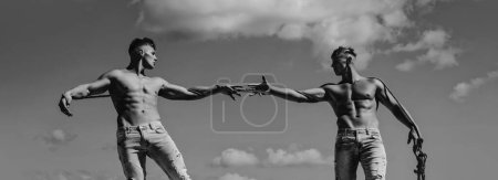Photo for Men arm, salvation. Two hands, helping arm of a friends, teamwork. Rescue, help gesture or hands. Strong hold. Power arms, friendship and teamwork. Muscular men arms - Royalty Free Image