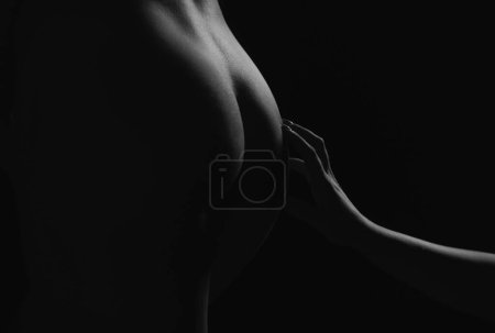 Foto de Sensual attractive young womans ass. Huge buttocks. Perfect young sexy girl butt - Imagen libre de derechos