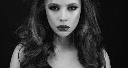 Photo for Elegant Fashion Model. Red lips, dark eyes makeup. Cosmetics products - Royalty Free Image